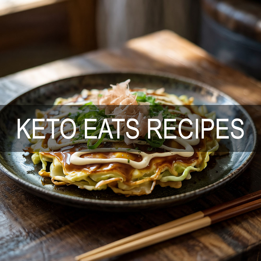 Keto Japanese okonomiyaki pancake with bonito, Kewpie mayo, and scallions