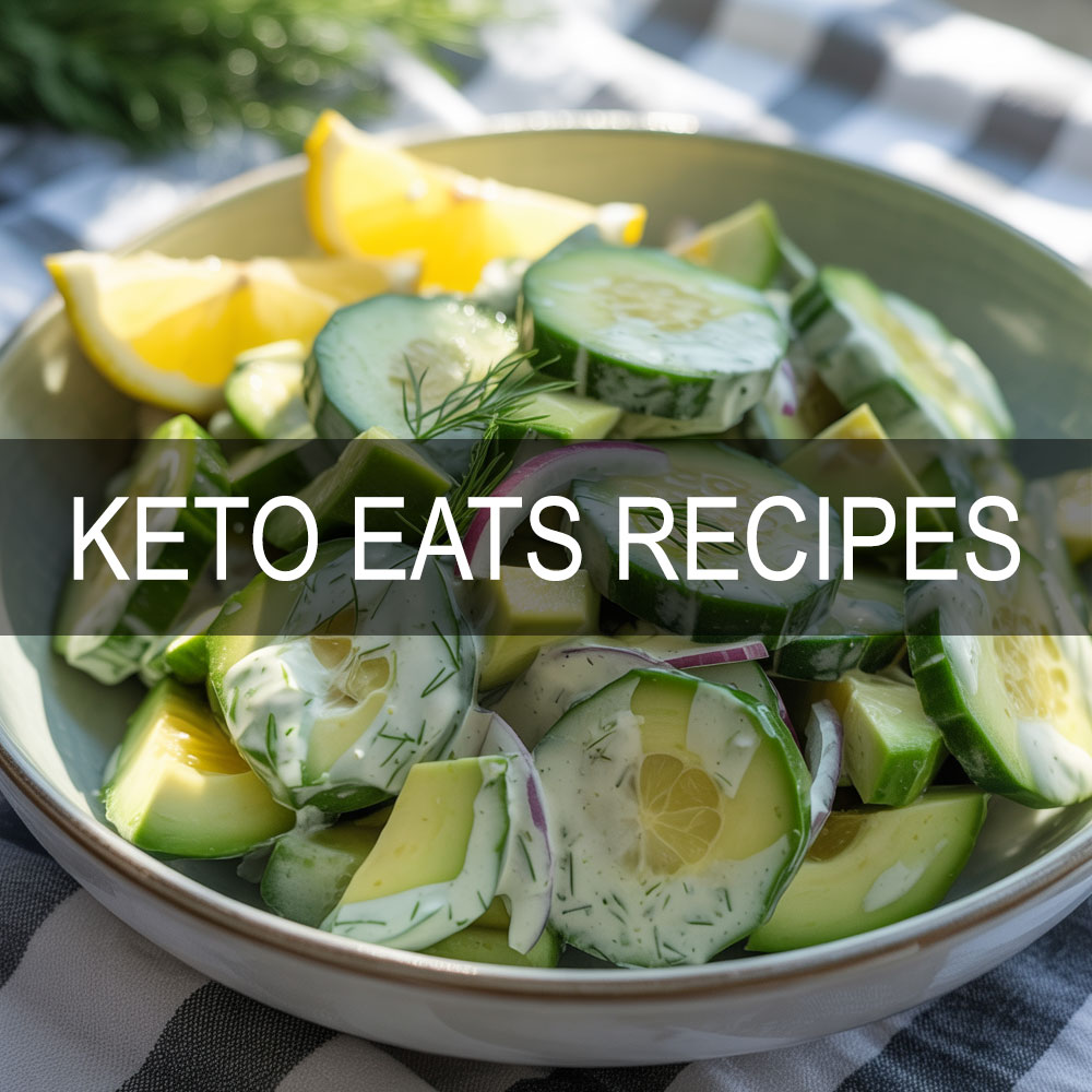 Creamy Dill Cucumber and Avocado Salad in a white bowl with red onion and fresh dill