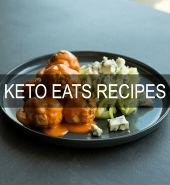 Buffalo chicken meatballs with celery slaw, keto dinner on a clean plate