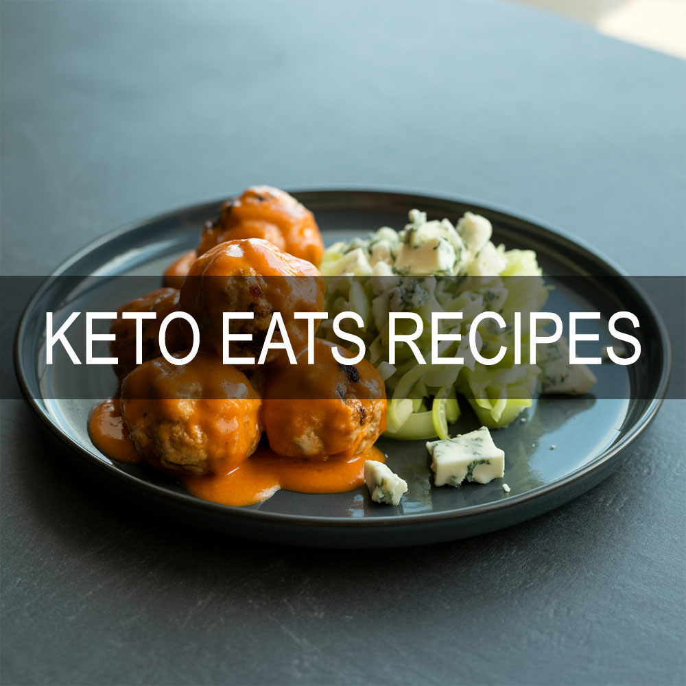 Buffalo chicken meatballs with celery slaw, keto dinner on a clean plate