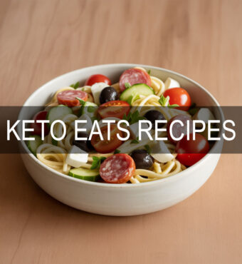 Keto Italian Pasta Salad with Palmini noodles, salami, mozzarella, and veggies in a white bowl