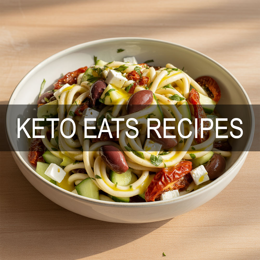 Mediterranean keto pasta salad with hearts of palm noodles, feta, olives, sun-dried tomatoes, and lemon vinaigrette